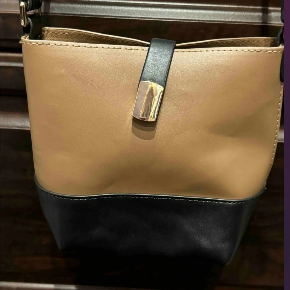 Elegant Tan and Black Crossbody Bag 7x8in with a 22in strap